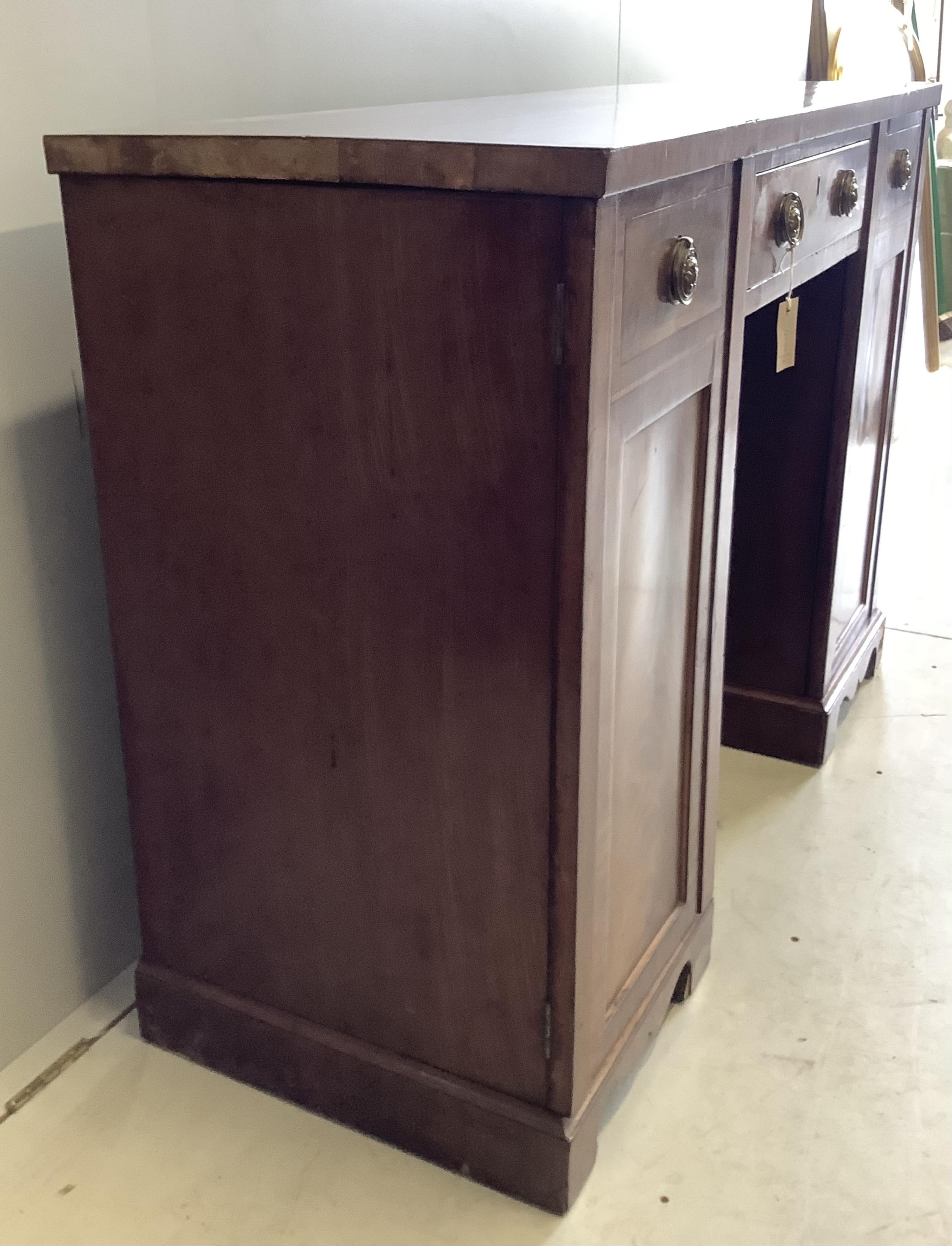 A George IV mahogany sideboard, width 132cm, depth 49cm, height 91cm. Condition - fair